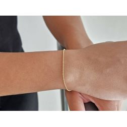 Bracciale palline oro giallo 20cm x 1.50mm chiusura occhiello a molla. Foto indossata