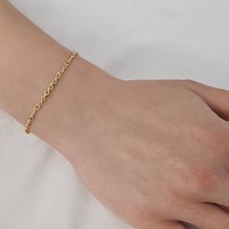 Bracciale corda Infinito alternato in Oro Giallo foto indossata