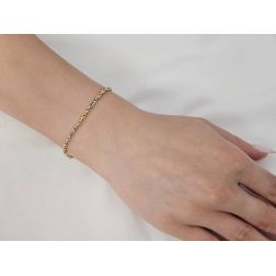 Photo of worn Baby Bracelet 3+1 spheres and perforated tube