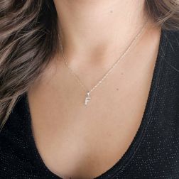 Photo of worn Initial Letter "F" Pendant with Diamonds in 18kt White Gold