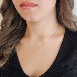 Photo of worn Initial Letter "M" Pendant with Diamonds in 18kt White Gold
