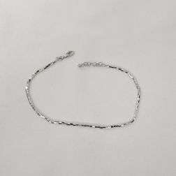 Bracciale/Cavigliera Tubetti ottagonali sfaccettati oro bianco.