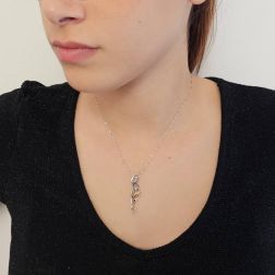 Photo of worn Hug “Pleasure” Pendant with Yellow Diamond