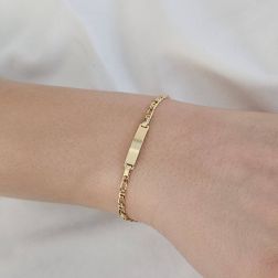photo of worn Baby 2.50mm side tiger bracelet with 3.90mm tag
