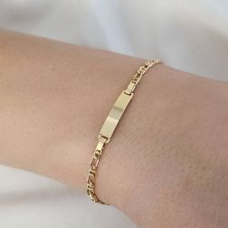 photo of worn Baby 2.50mm side tiger bracelet with 3.90mm tag