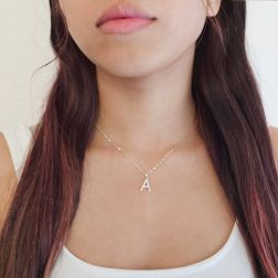 Photo of worn Initial Letter "A" Pendant with Zircon in White Gold
