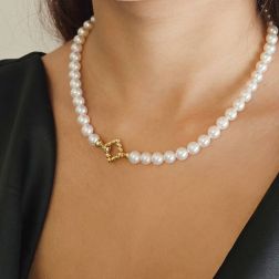 Photo of worn Akoya Pearl Necklace with Twisted Square Clasp in Yellow Gold