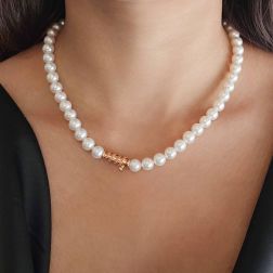 Photo of worn Akoya Pearls Necklace with Spiral Clasp and Mandarin Sapphires