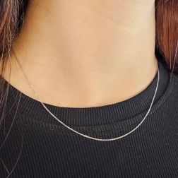 Photo of worn Platinum Forzatina chain necklace 40cm x 0.90mm
