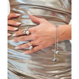 Photo of worn Wave Design Ring with Tahitian Pearl and Pavé Diamonds