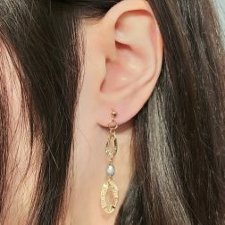 Photo of worn Yellow and White Gold 3 oval Pendant Earrings