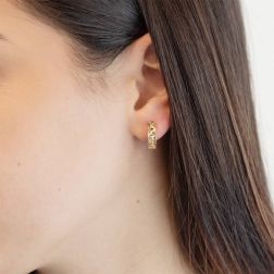 Photo of worn Diamond diamond perforated rectangular barrel hoops 1.50cm x 3.80mm