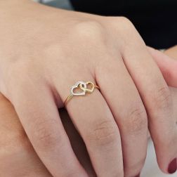 Photo of worn Ring with 2 Perforated Hearts in Yellow Gold and White Gold