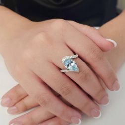photo of worn of Contrariè Ring with teardrop Aquamarine and Diamonds in Platinum