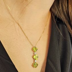 Photo of worn Trilogy Peridot Carré and Diamond on Venetian Necklace