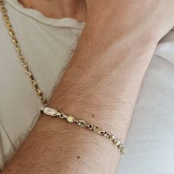 Photo of worn D&R bracelet in White and Yellow Gold