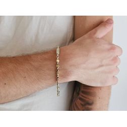 Photo of worn D&R bracelet in White and Yellow Gold