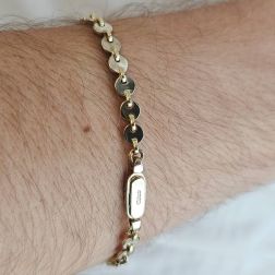 Bracciale disc sequin in Oro Bianco e Giallo foto indossata