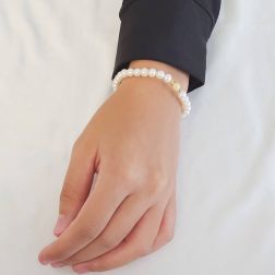 photo of worn Pearls Bracelet with yellow gold sandblasted sphere