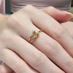 Photo of worn three bands Trilogy Flower ring in Yellow Gold and Diamonds
