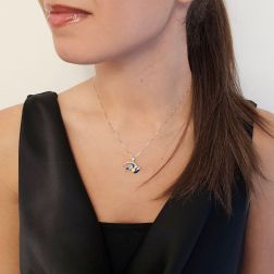 Photo of worn Blue Fish Pendant