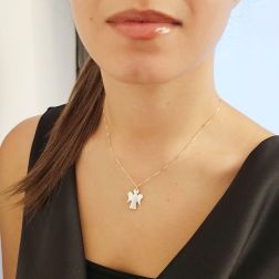 Photo of worn Two-tone angel and mother-of-pearl pendant