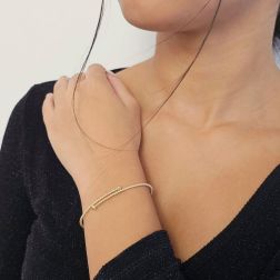Photo of worn Open Bangle Bracelet with Beads in Yellow Gold