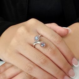 Photo of worn Stems Ring Multicolor Acquamarine and Mandarin Sapphires