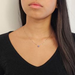 photo of worn 5mm Solitaire Tanzanite Necklace