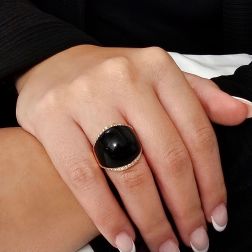 Photo of worn Diamonds and Onyx Dome Ring