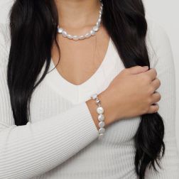 White pearl button bracelet with white gold ball clasp photo worn