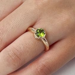 Round Solitaire Ring with Peridot and 18 Diamonds in Rose Gold photo worn