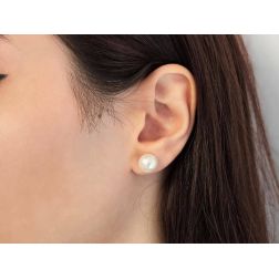Photo of worn Pearl earrings 10.50mm in White Gold