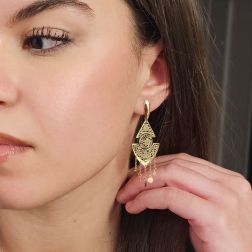 photo of worn Yellow gold filigree Etruscan style drop earrings