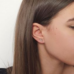 photo of worn White Gold Feather Earrings