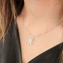 Ciondolo Bimbo oro Bianco e Diamanti foto indossata