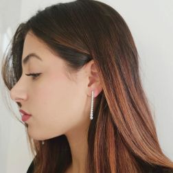 Photo of worn Scalar Tennis Earrings 4cm with 30 Diamonds