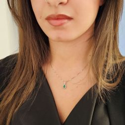 Photo of worn Pendant Kate Emerald 6x4mm and 14 Diamonds