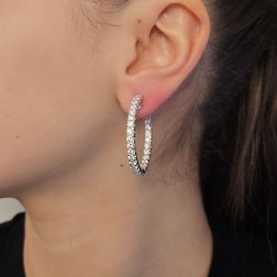 Photo of worn Hoops with 58 diamonds 5.36ct clip closure in white gold