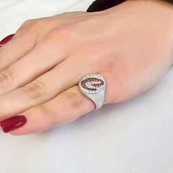 Photo of worn Letter C Chevalier Ring with Mandarin Sapphires and Diamonds