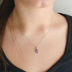 Photo of worn Cross with Blue Sapphires and Diamonds - Width 6.7mm