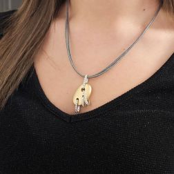 photo of worn Satin-finish Egg pendant in Yellow Gold and Diamonds