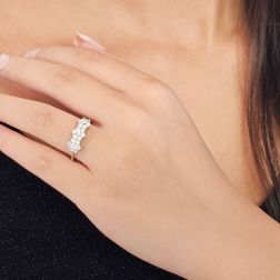 Photo of worn Trilogy Diamonds Flower Ring - Width 7mm