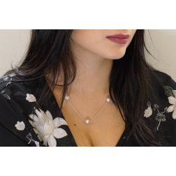 Photo of worn White 18kt Gold necklace with 3 Akoya Pearls