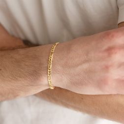 Photo of worn 4.30mm Figaro yellow gold bracelet