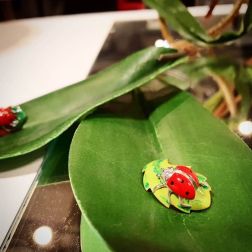 Gold Ladybug on Bronze Leaf Pendant