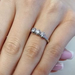 Photo of worn Cross-Vault Trilogy Ring in White Gold with GIA Diamonds