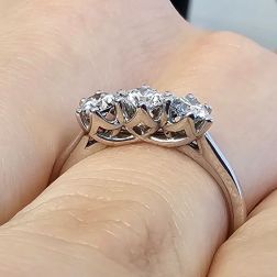 Photo of worn Cross-Vault Trilogy Ring in White Gold with GIA Diamonds