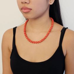Photo of worn 9.50-10mm Natural Coral 49cm necklace Octagonal clasp Yellow and Rose Gold
