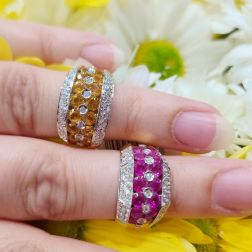 Banded design ring with 14 Pink Sapphires and 50 Diamonds